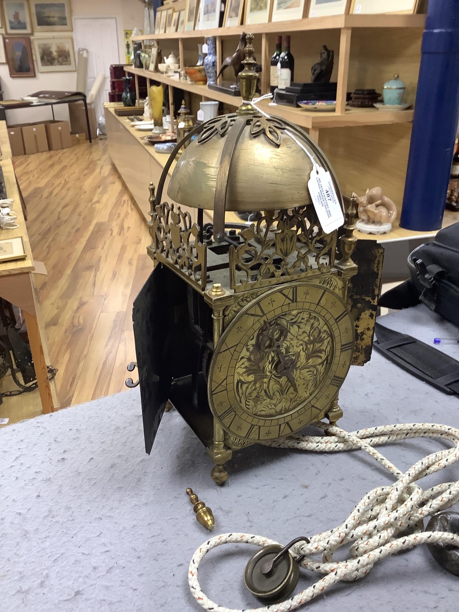 An 18th century and later brass lantern clock, 39cm